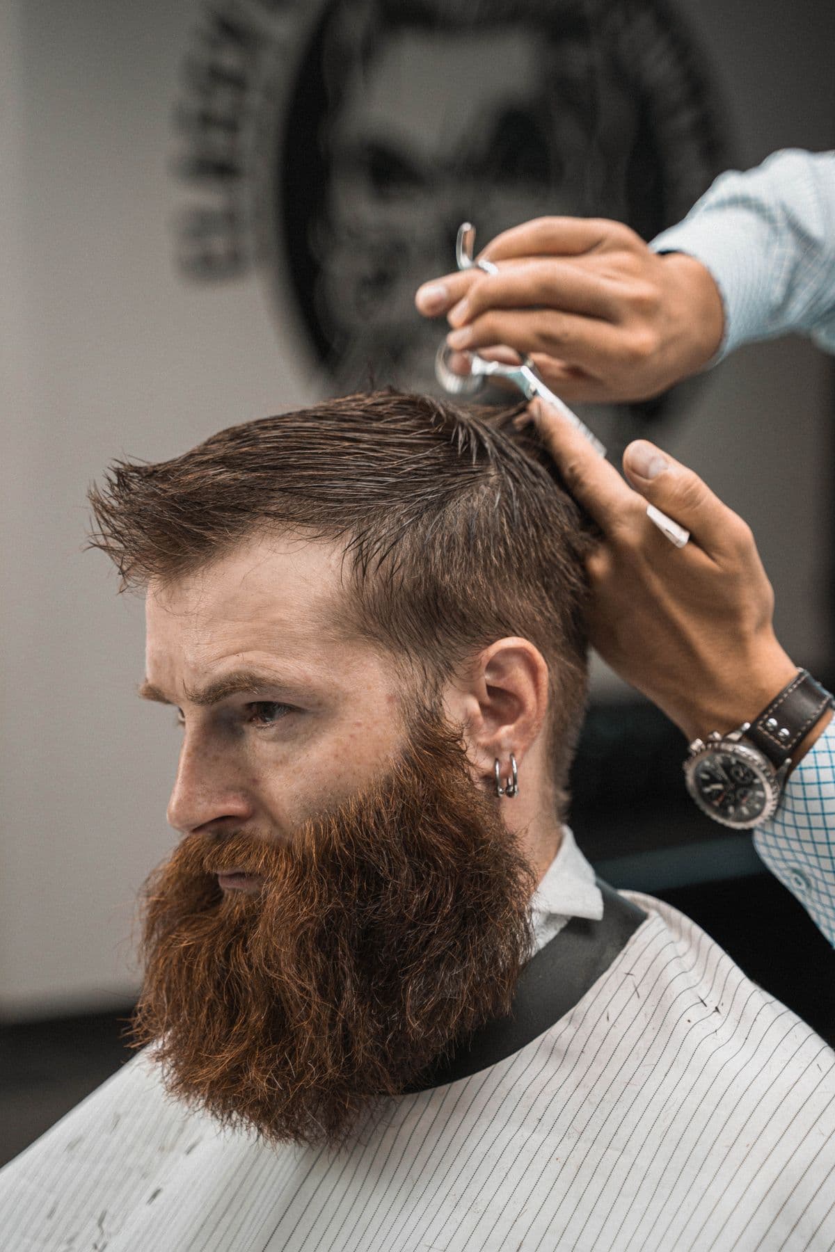A barber lining up a fresh cut